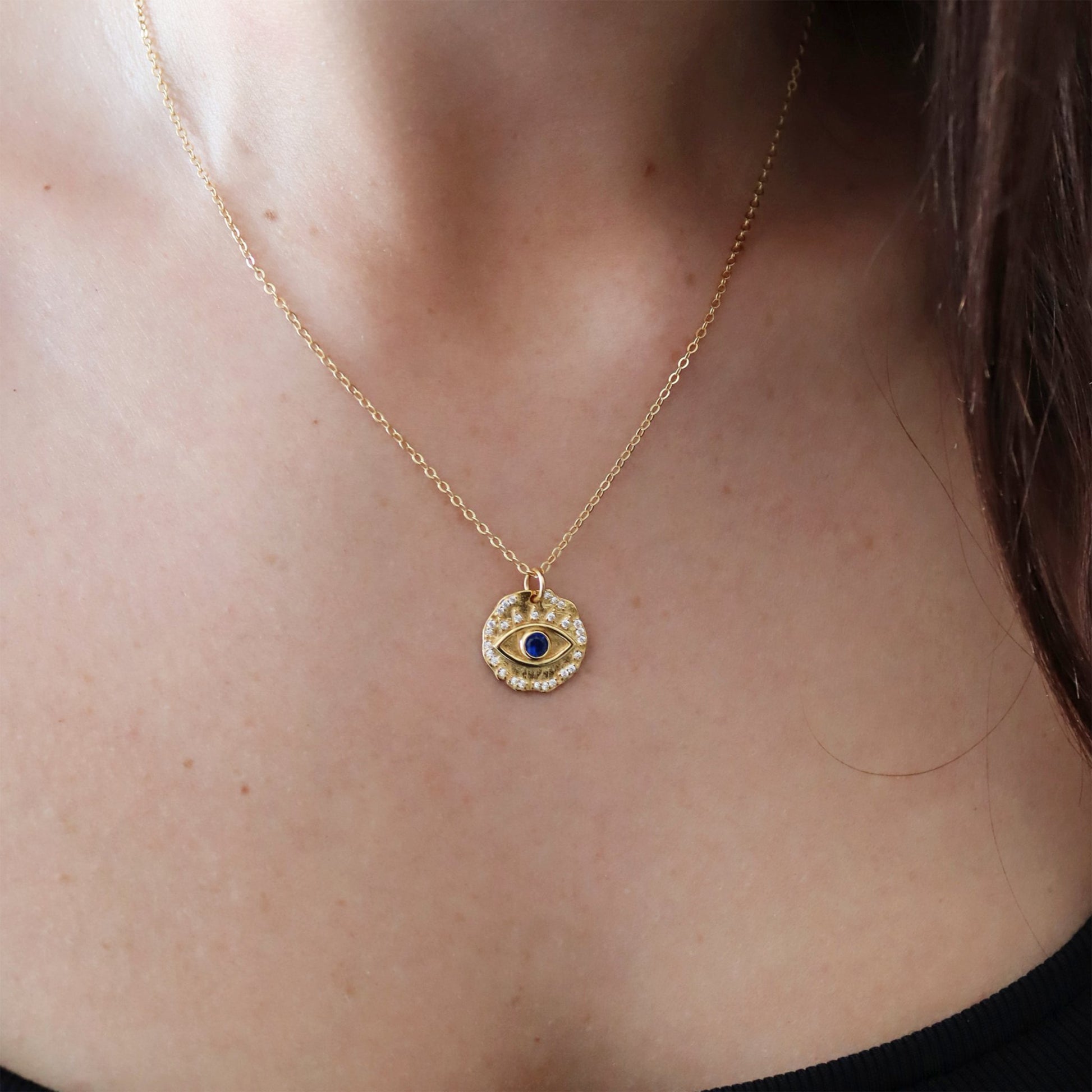 Woman Modelling Evil Eye Gold Sterling Silver Cubic Zirconia Blue Gemstone Round Pendant Necklace 