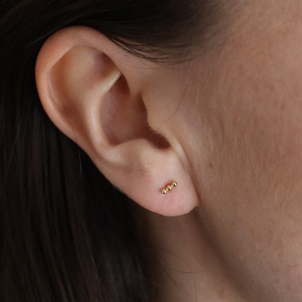 Close Earshot Woman Modelling Beaded Trio 18kt Gold Plated 925 Sterling Silver Stud Earrings - Gemzis