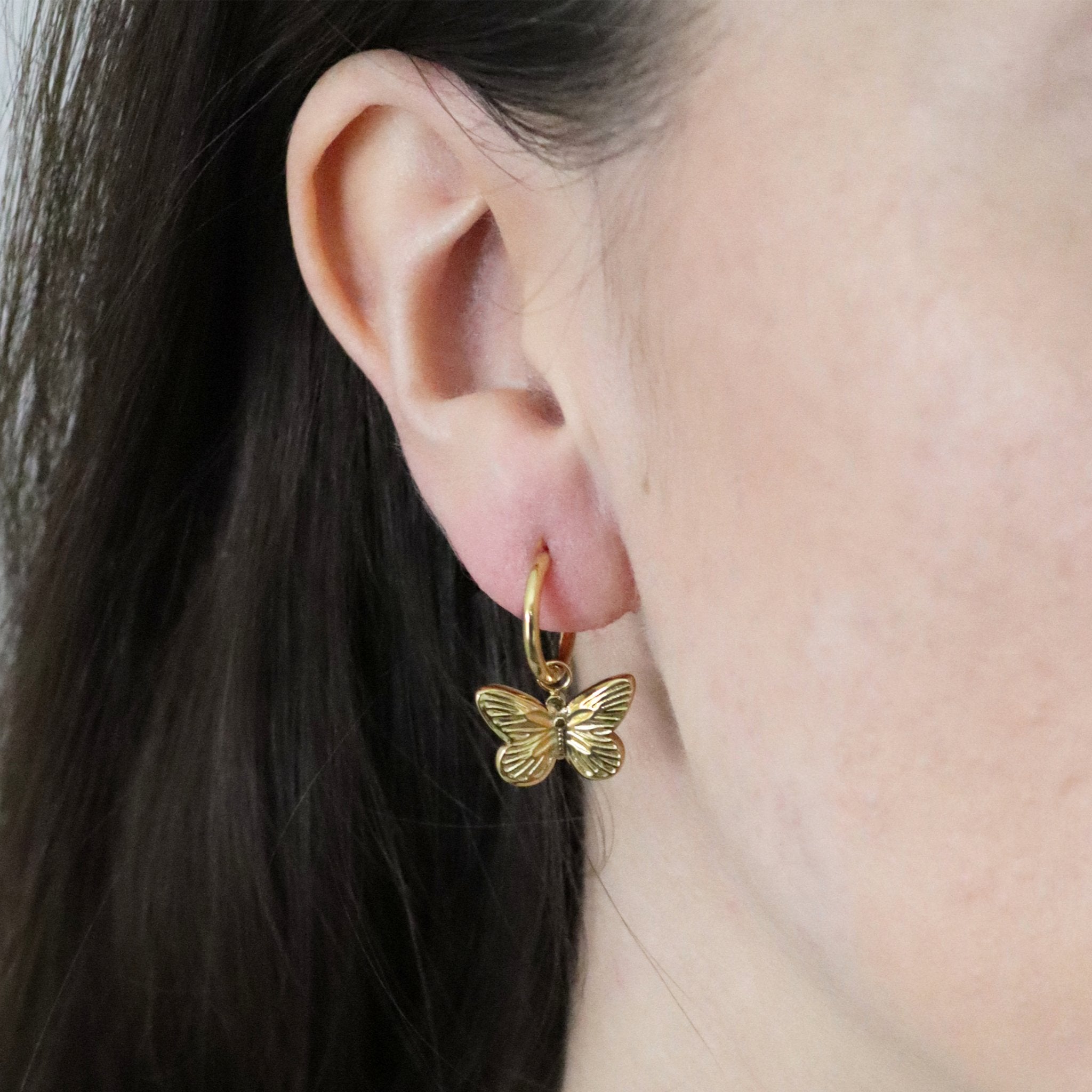 Butterfly Gold Huggie Hoop Earrings Secondary image